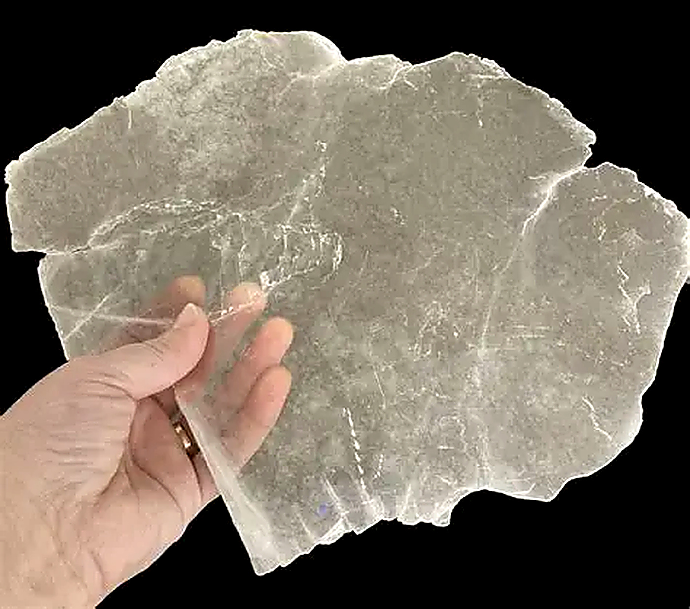 Clear Muscovite mica sheet held up to light
